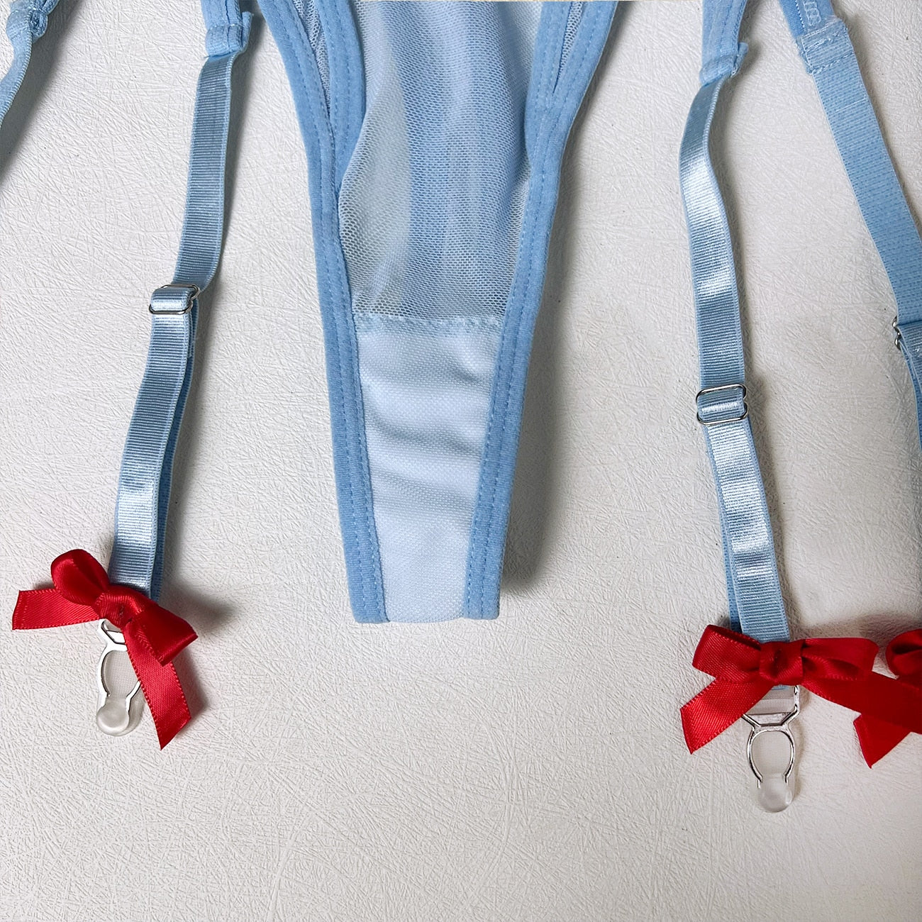 Ensemble lingerie avec nœuds et volants - Ensemble 4 pièces à épaules dénudées à la mode comprenant une culotte et un porte-jarretelles