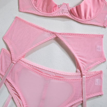 Einheitliches Dessous-Set mit Aussparungen - Flirtendes Rückenfreies Höschen in Rosa mit Verführerischem Strumpfband-Set